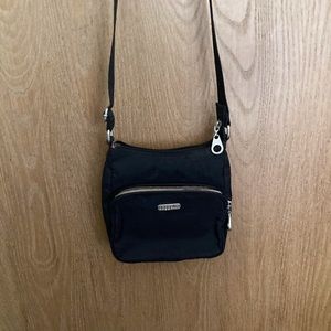 Baggalini cross body bag. Mi.  7”x7”  Black.. Adjustable strap 43”.